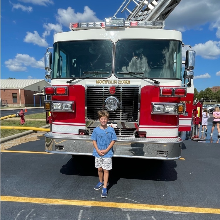 boy and fire truck