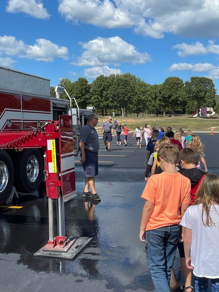 kids and fire truck