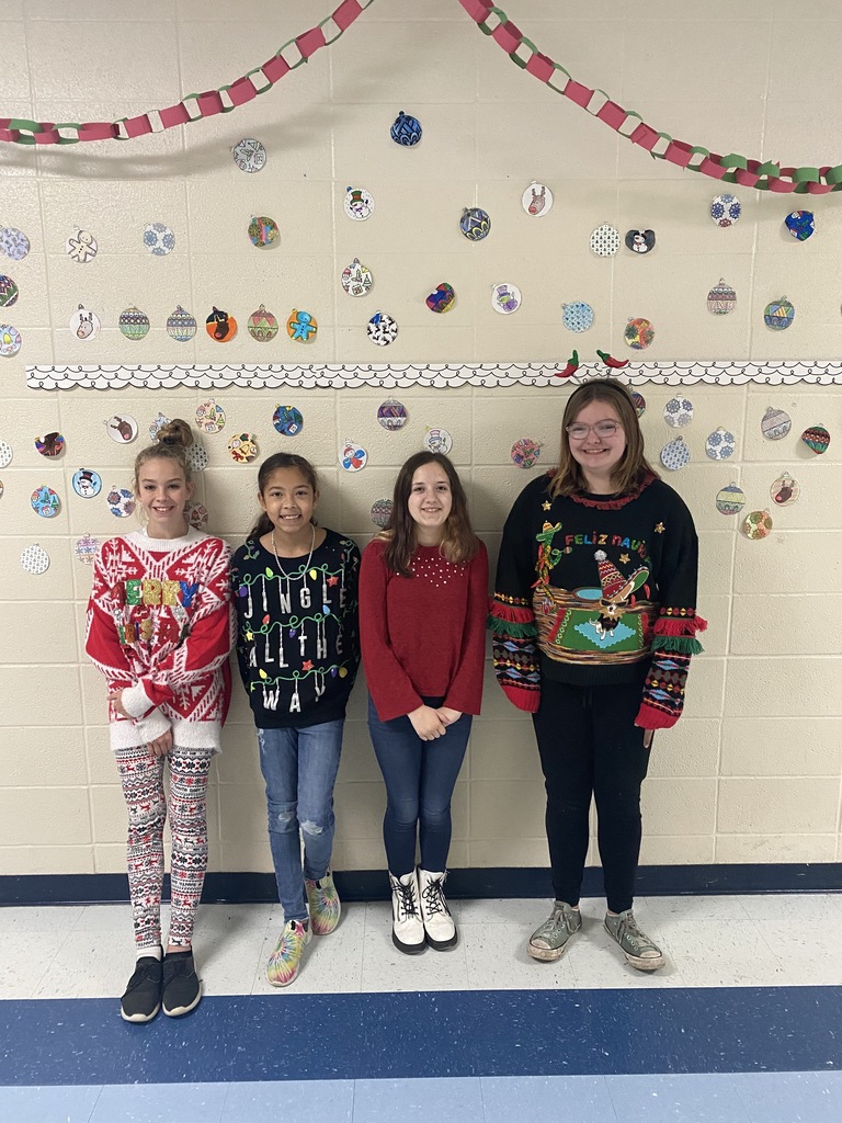 Pinkston students wearing "Ugly Christmas Sweaters"
