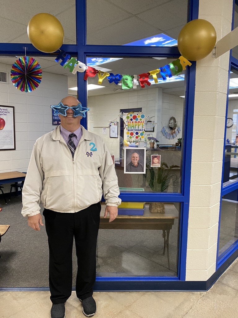 kindergarten principal Mr. Roach with his birthday glasses on. 