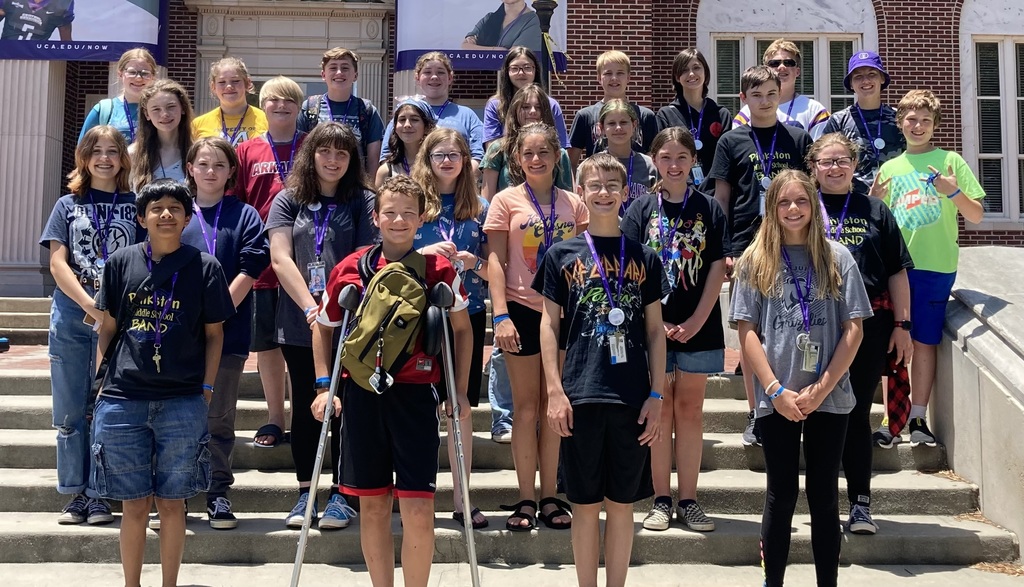 band students pose on steps of UCA band camp