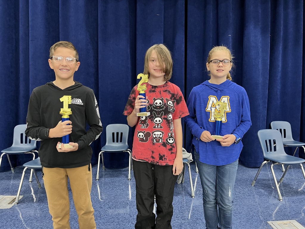 three spelling bee winners from 4th grade