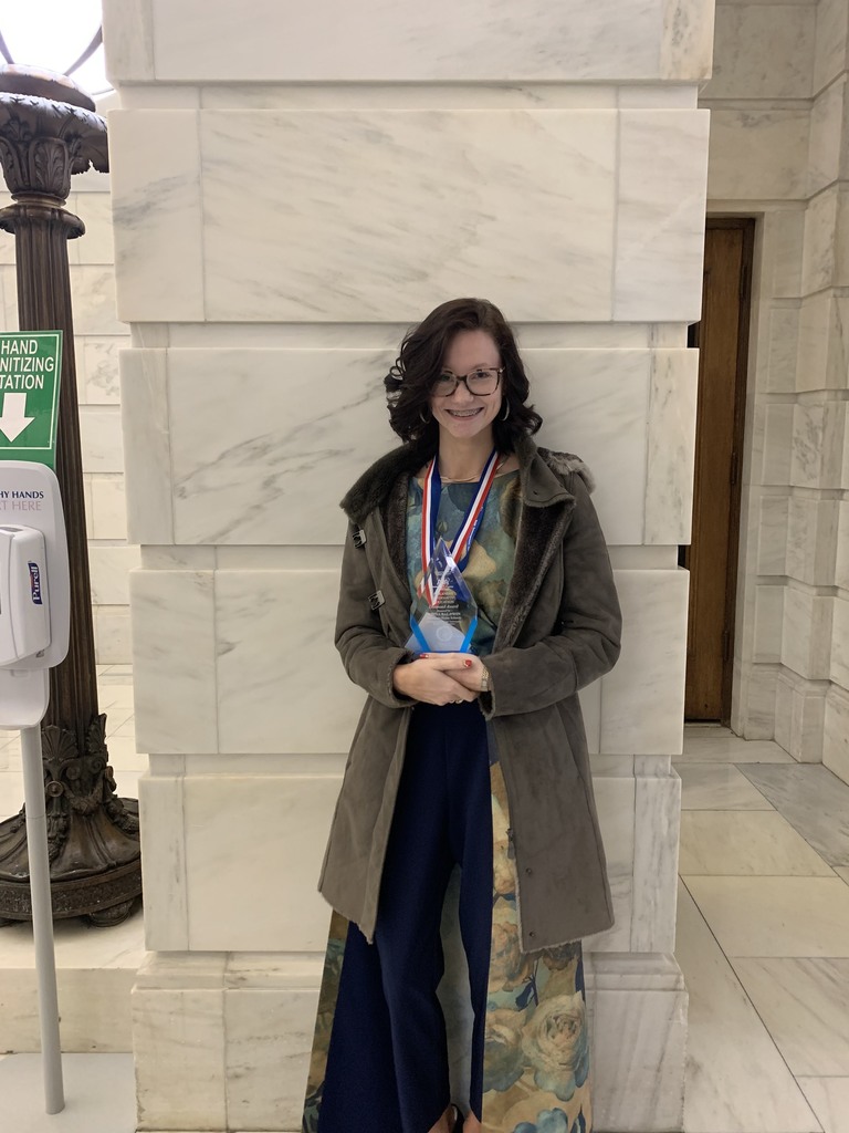 high school girl with award