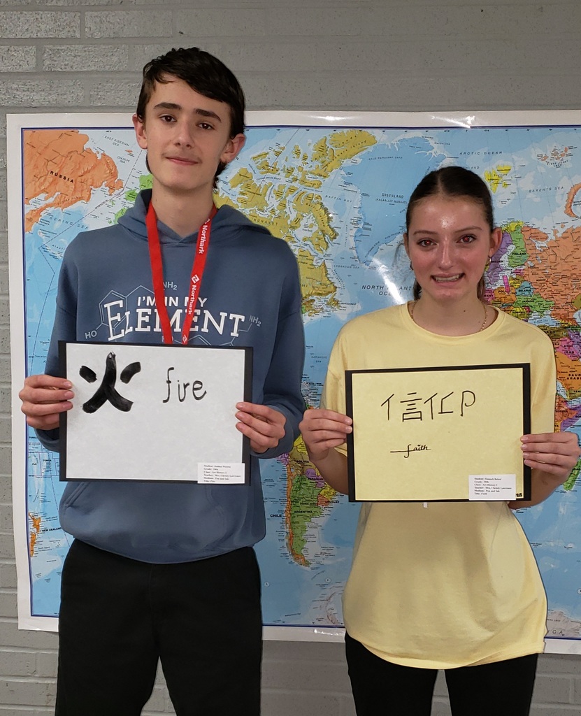 joshua westra and hannah baker with art projects